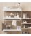 Estantería STRING de 3 módulos con 1 cabinet y 1 mesa plegable en fresno con paneles blancos.