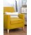Sillón tapizado en tela mostaza con pies de madera natural AINA